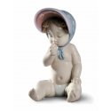Figurina Bimba con berretto