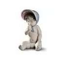 Figurina Bimba con berretto