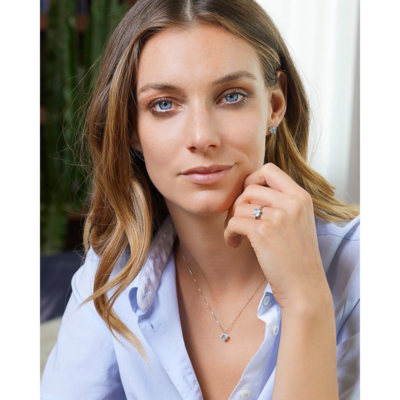 Anello In Oro Bianco Con Topazio Azzurro Carrè