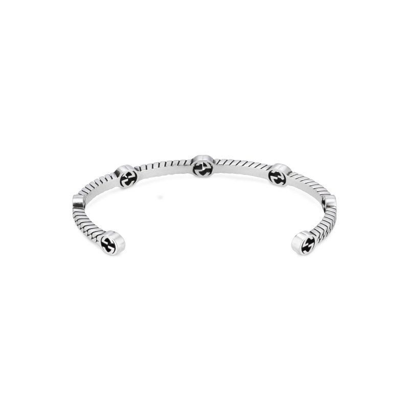 Bracciale con motivo G intrecciata in argento sterling