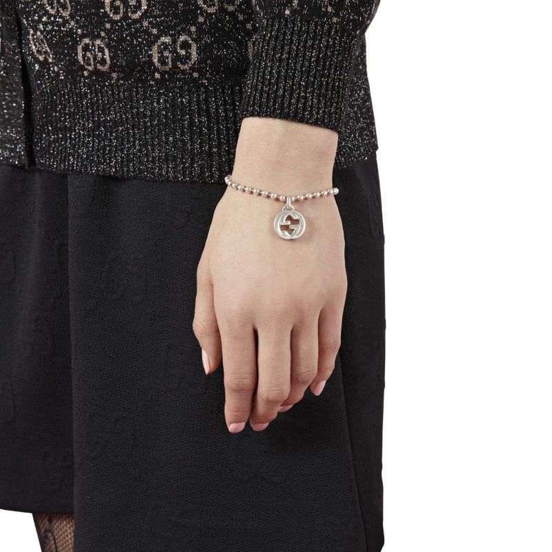 Bracciale con motivo G intrecciata in argento sterling
