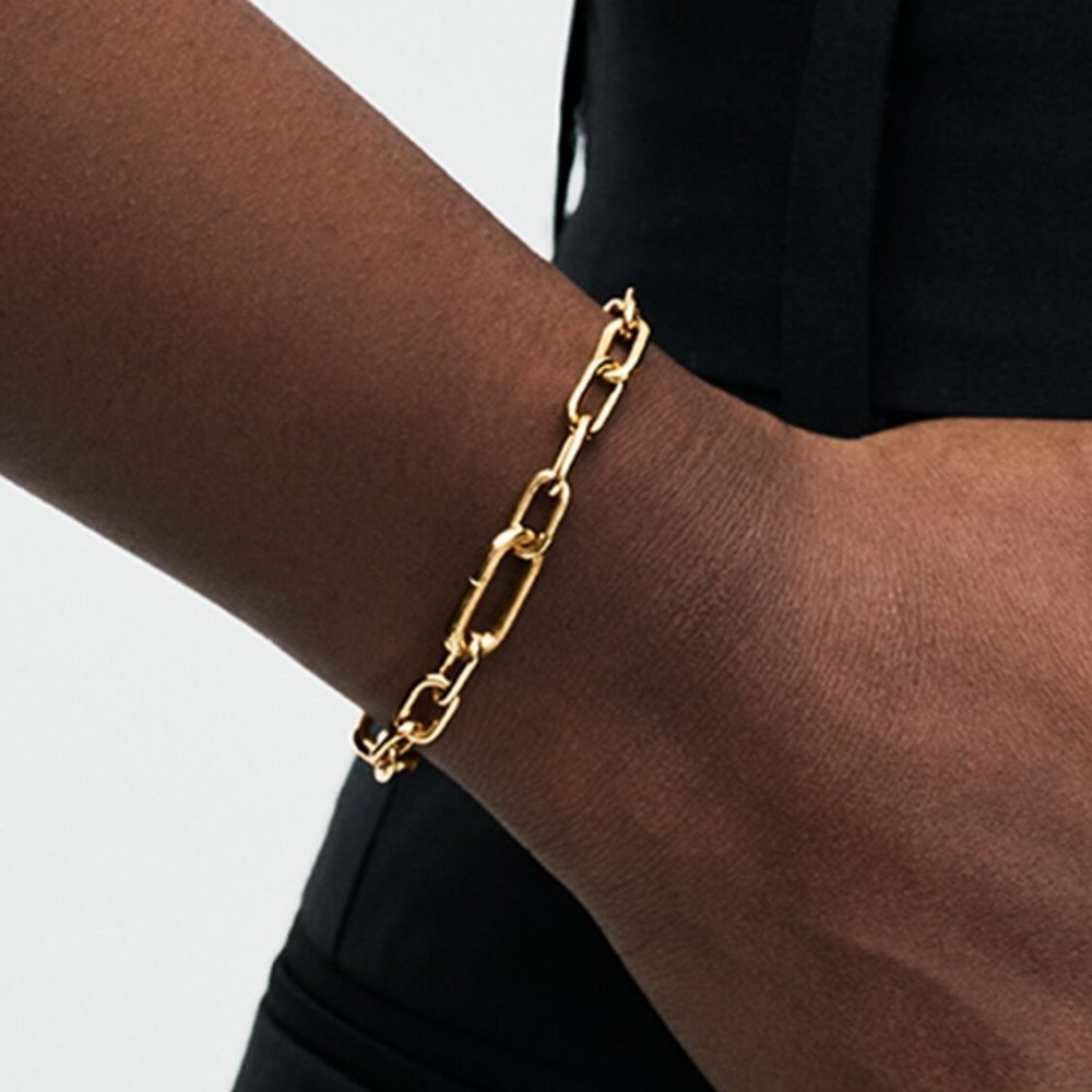 Mixa ciò che ami. La catena maglia link placcata oro 14k offre infinite possibilità di styling. Con 2 link apribili, 4 link tra 